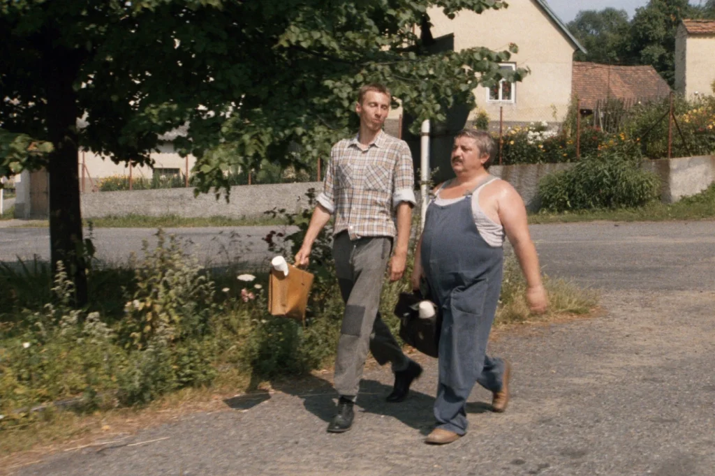János Bán and Marián Labuda in My Sweet Little Village (1986)